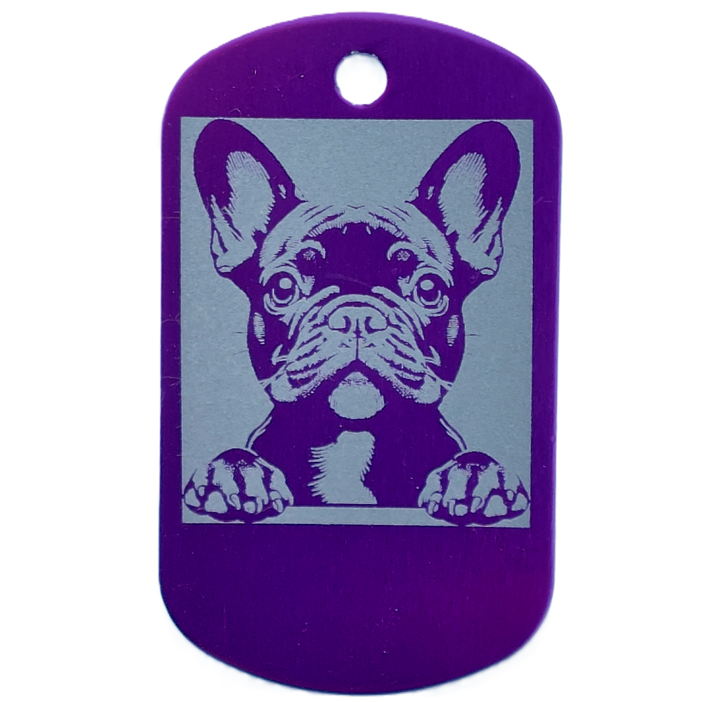 Purple dog id tag with a engraved image of a dog on a white background