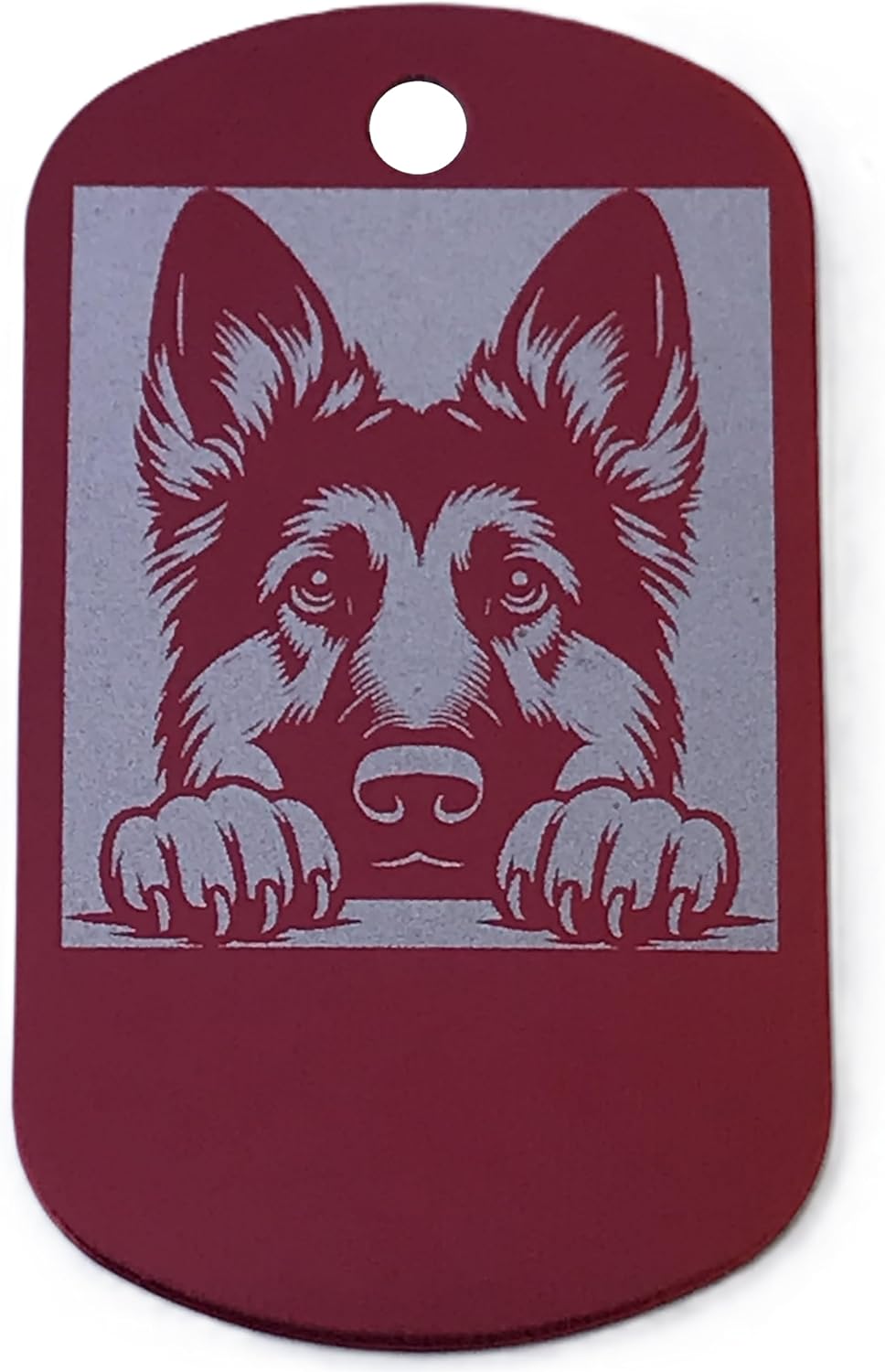 Dog id tag with a German Shepherd design on a red background